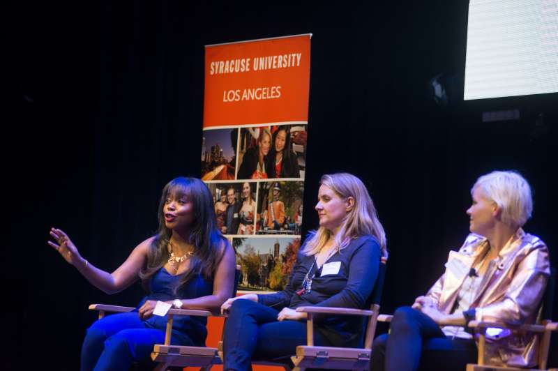 Lyric Lewis speaking to alums at the Jack Oakie Comedy event