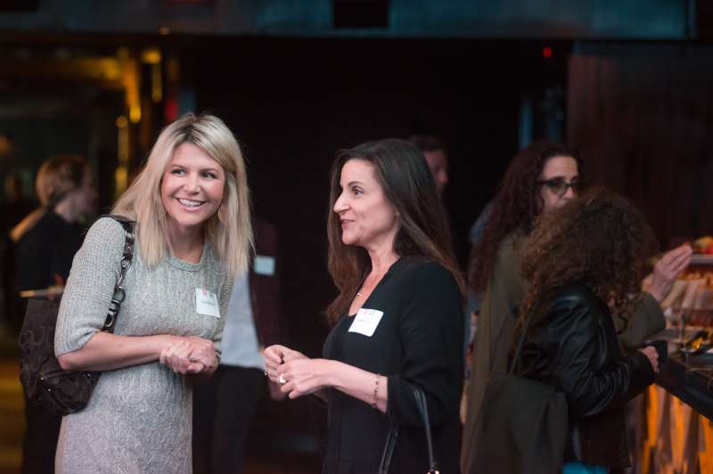 Alumnas enjoying the Jack Oakie reception