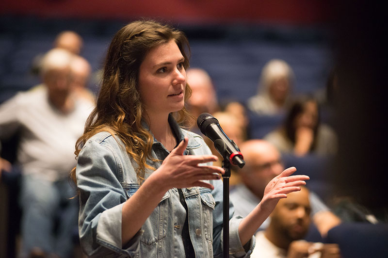 Alum asks a question for the S.W.A.T. panel