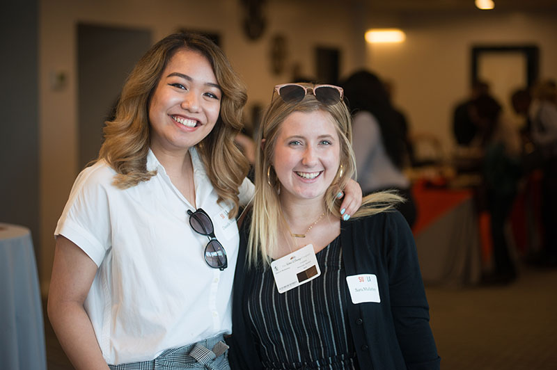 Alumni enjoying the S.W.A.T. reception